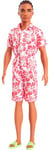 Barbie Fashionistas Ken Doll #235 with Braided Brown Hair, Wearing Coral Jumpsuit with Hawaiian Print and Green Sandals, HYT99