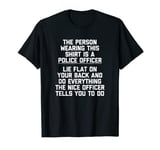 The Person Wearing This Shirt Is A Police Officer - Funny T-Shirt