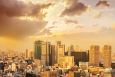 Cityscape of tokyo city sunset sunrise skyline in Aerial view with skyscraper modern business office building with blue sky background in Tokyo metropolis city Japan