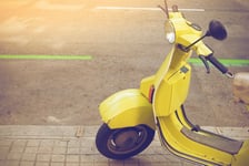 Detail of old vintage scooter parked on the street in Barcelona Spain