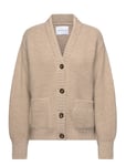 The Knotty S Žemiau Cardigan Beige